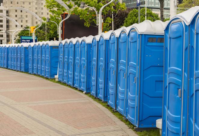 multiple portable restrooms in a neat and tidy row in Fort Belvoir